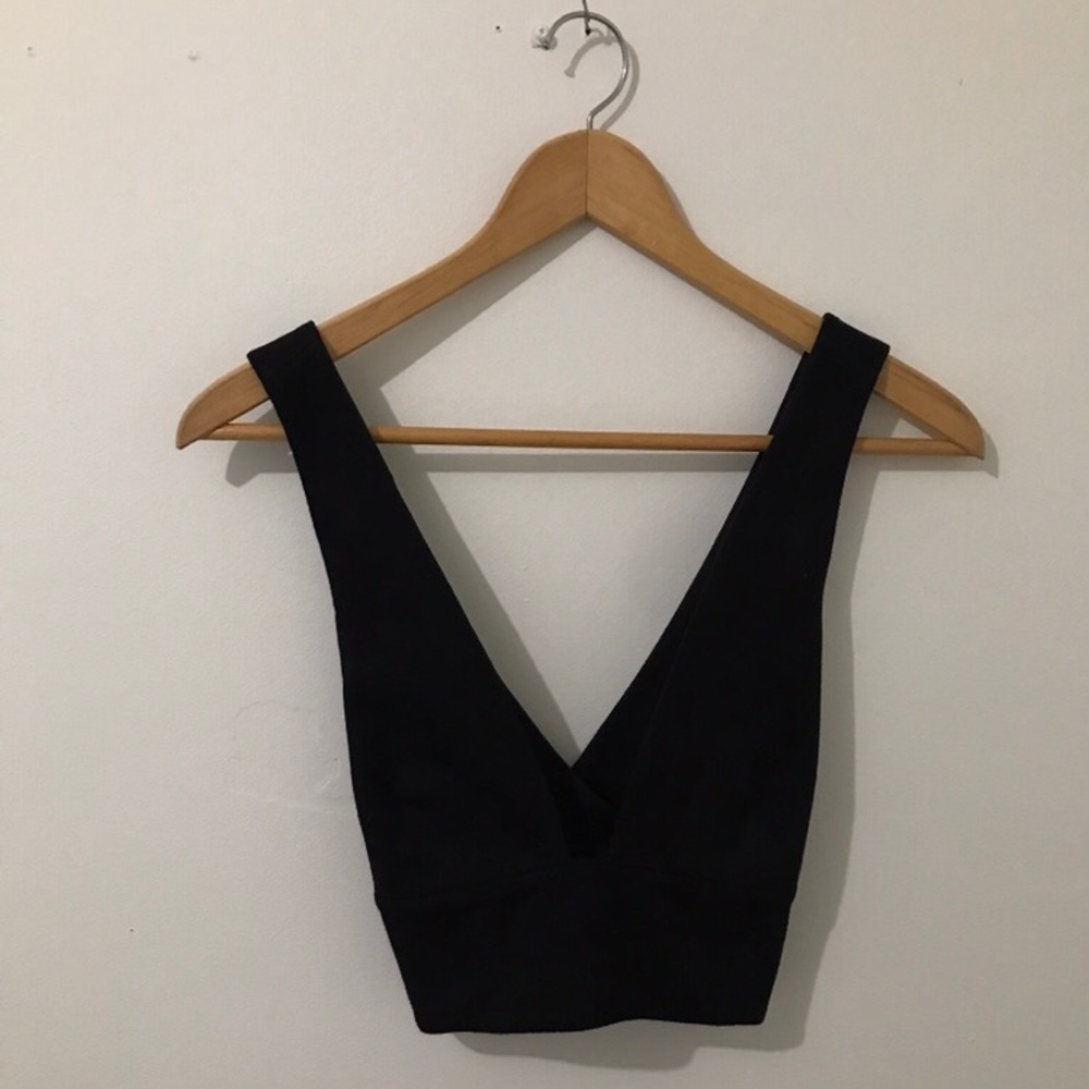 Black sueded cross backed crop top by Aritzia.